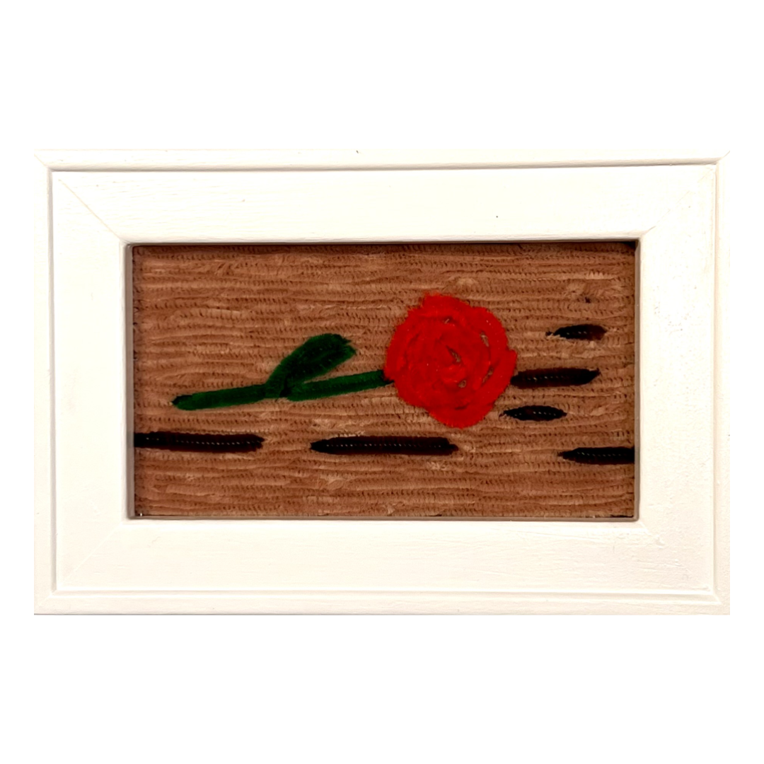 Rose on a Wood Table